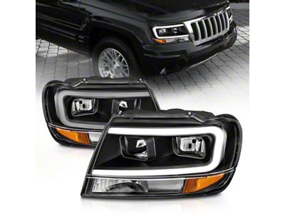 Anzo USA 99-04 Jeep Grand Cherokee Crystal Headlights - w/ Light - 111537