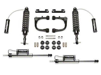 Fabtech 15-19 Toyota Tacoma 2WD/4WD 3in UCA System w/DL 2.5 Resi Coilovers & Rear DL Resi Shocks