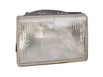 Omix-ADA Left Headlight 93-98 Jeep Grand Cherokee ZJ - 12402.07