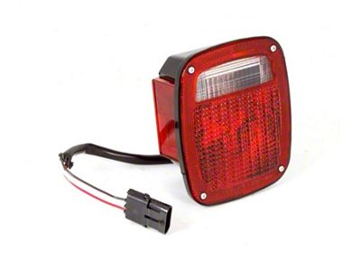 Omix-ADA Tail Light Black Housing LH 87-90 Jeep Wrangler - 12403.11