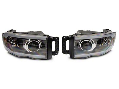 Raxiom 02-05 Dodge RAM 1500/2500/3500 Axial LED Projector Headlights- Blk - R131477