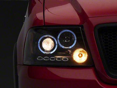 Raxiom 04-08 Ford F-150 Dual LED Halo Projector Headlights- Black - T542827