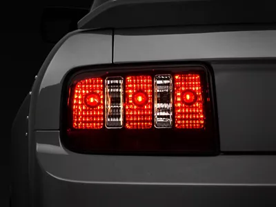 Raxiom 05-09 Ford Mustang Coyote Tail Lights- Blk Housing Smoked - 49117