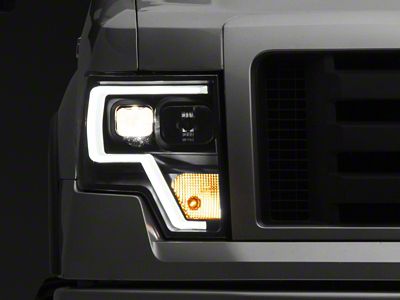 Raxiom 09-14 F-150 Projector Headlights w/ LED Accent- Black Housing - T542845