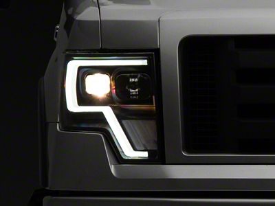 Raxiom 09-14 Ford F-150 G4 Projector Headlights- Black Housing Clear - T544003