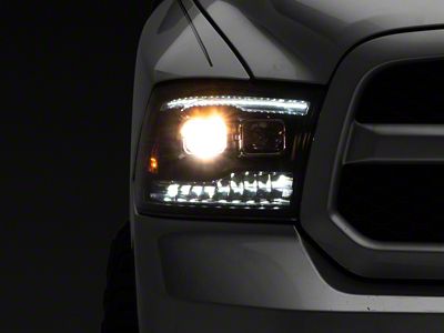 Raxiom 09-18 RAM 1500 LED Projector Headlights w/ Switchback Turn - R111520