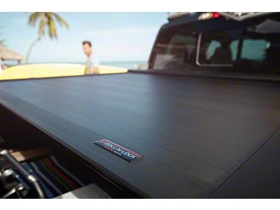 Roll-N-Lock 15-17 Chevy Silverado/Sierra 2500/3500 77-3/8in E-Series Retractable Tonneau Cover - RC221E